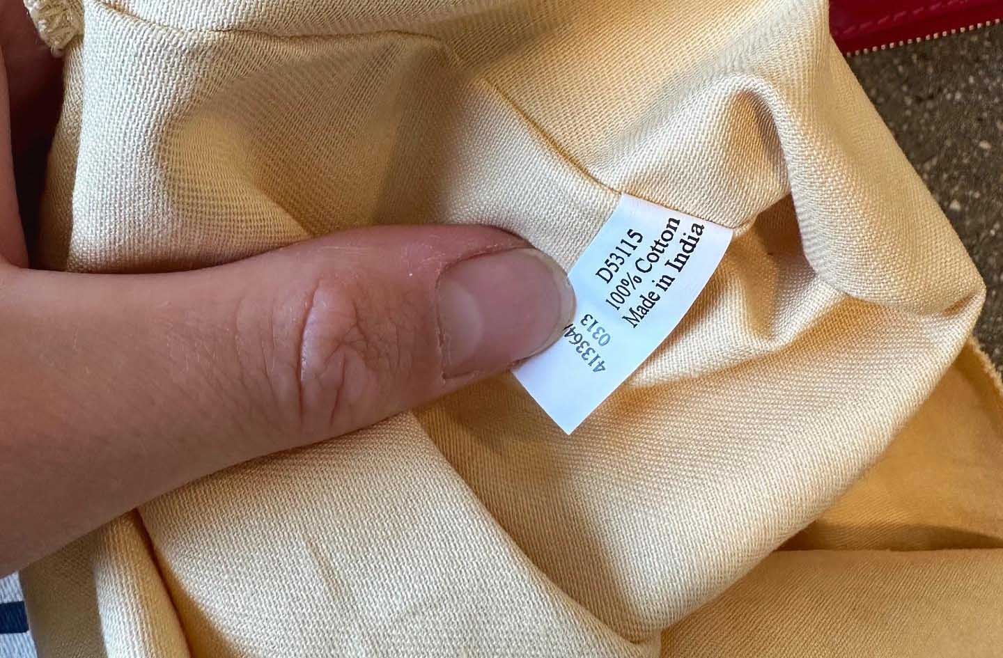 cotton drawstring detail and internal tag
