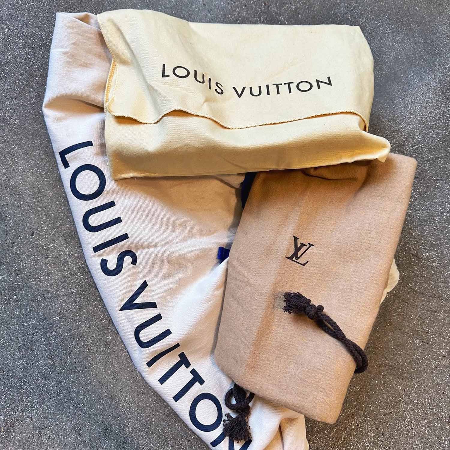 cream colored louis vuitton dust bag texture
